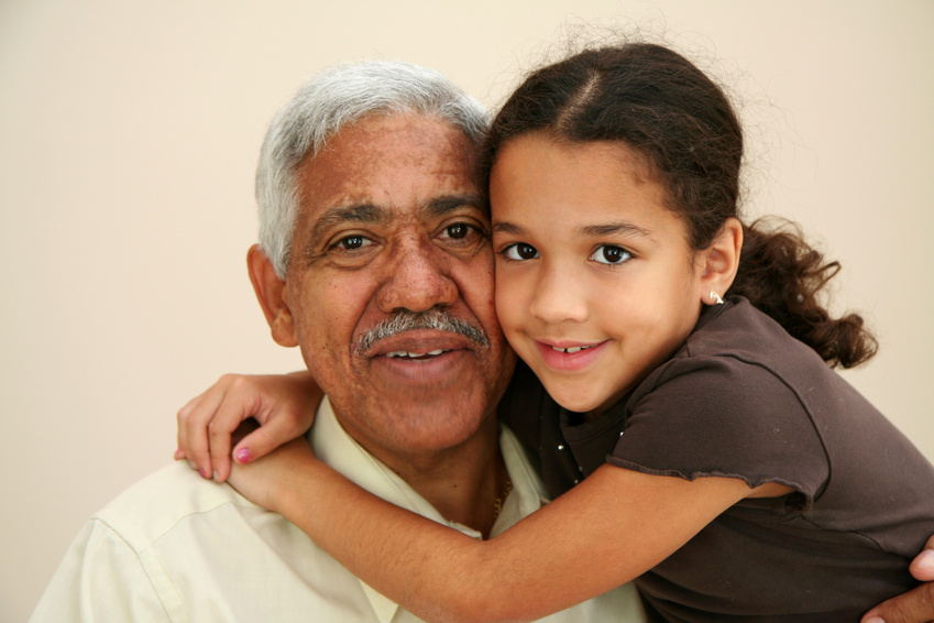 Grandchild hugging grandparent