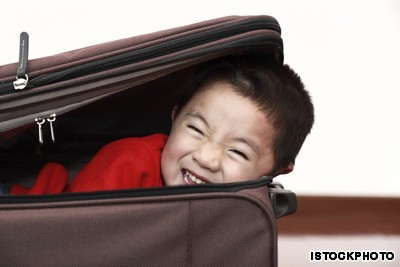 kid in suitcase