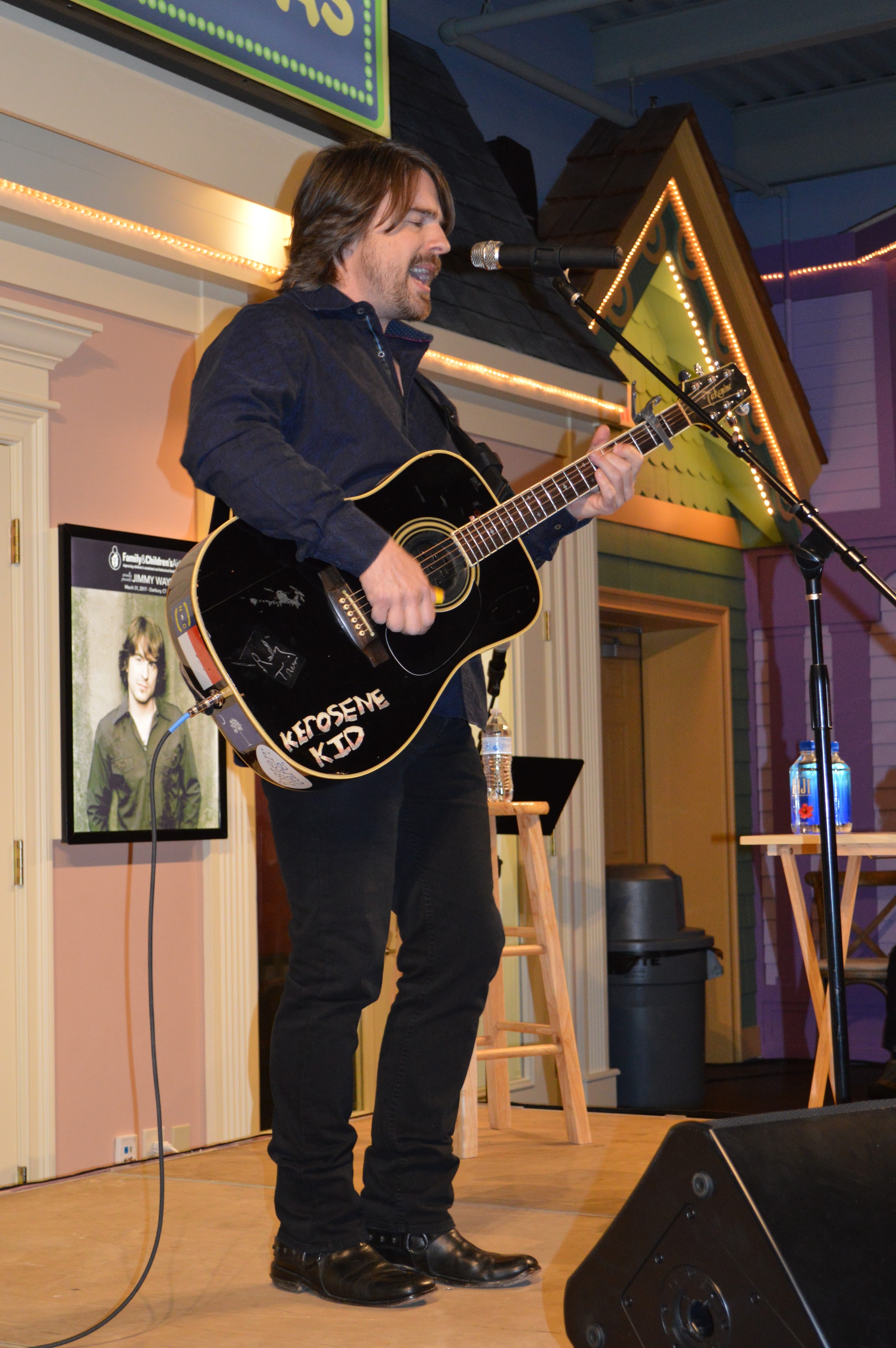 Jimmy Wayne performing in Playmaker Village